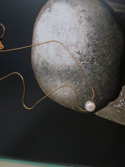 Single Floating Round Freshwater Pearl Necklace