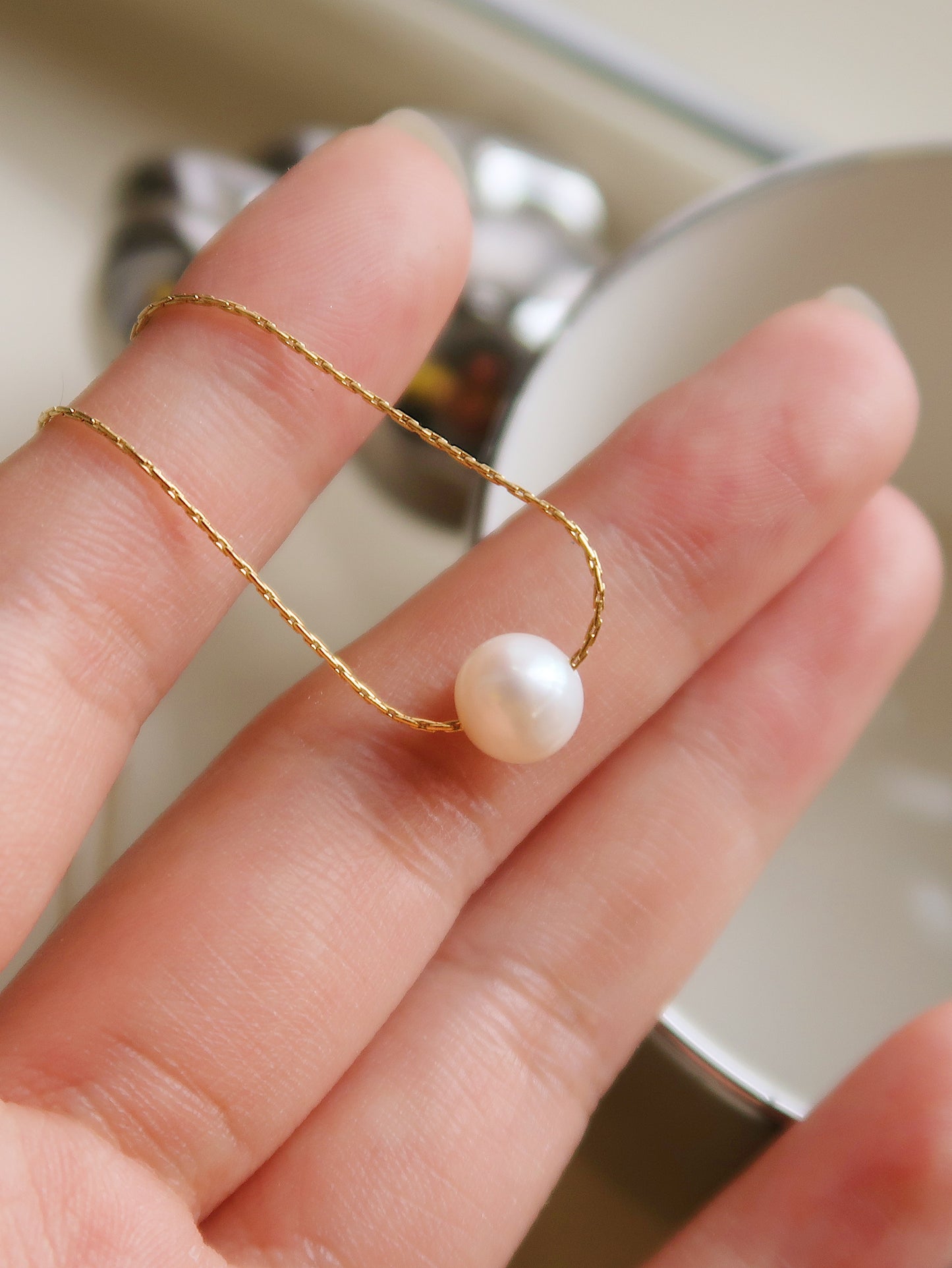 Single Floating Round Freshwater Pearl Necklace