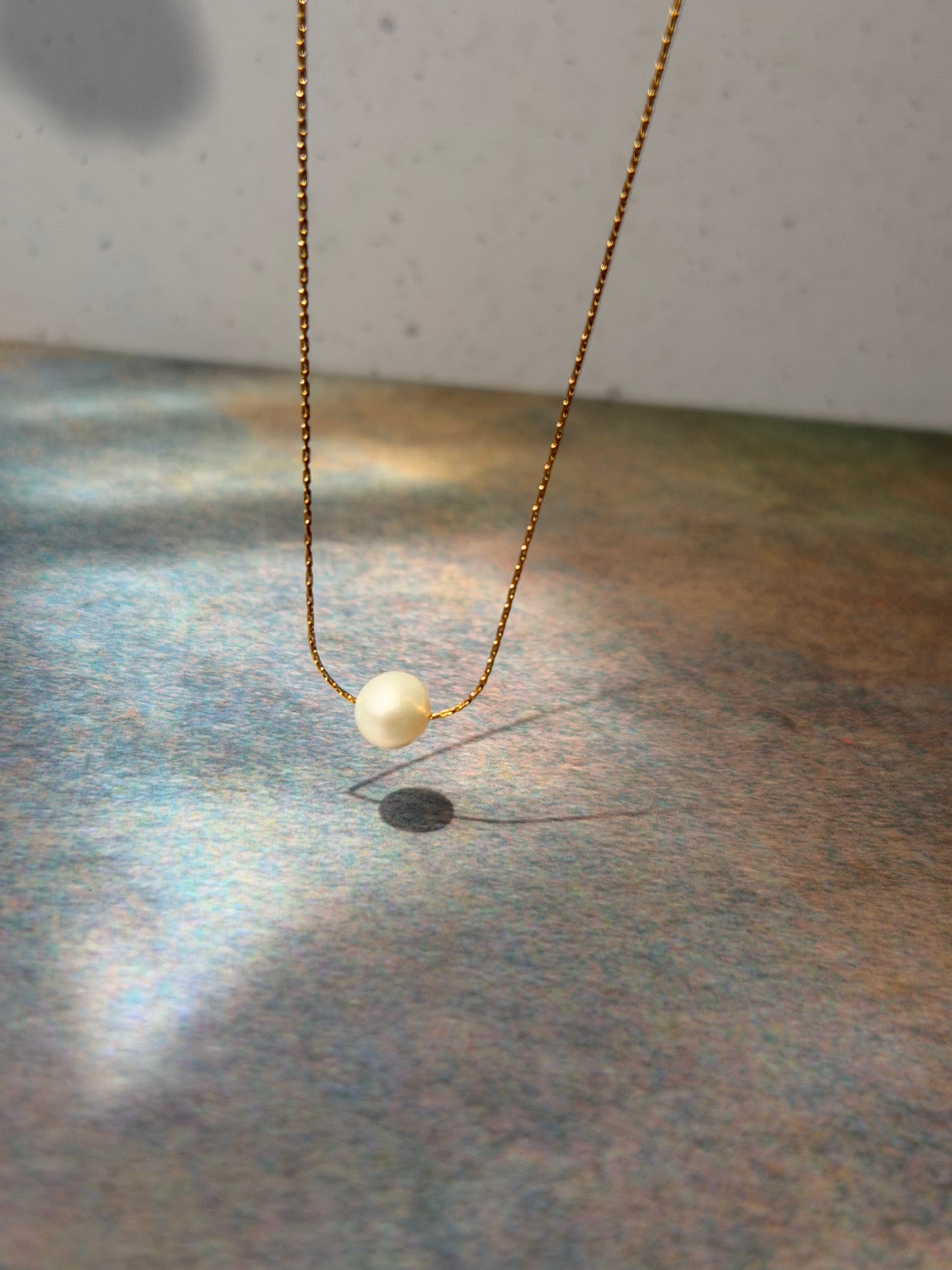 Single Floating Round Freshwater Pearl Necklace